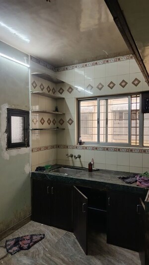 Kitchen in 1 BHK Apartment at Onkar Park Apartment, Dhankawadi – for Rent