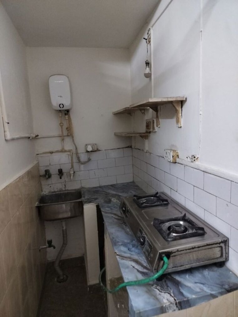 Kitchen, arun-vihar 1 RK 200 Sq.Ft. Apartment In Sector 29 Noida 10464451