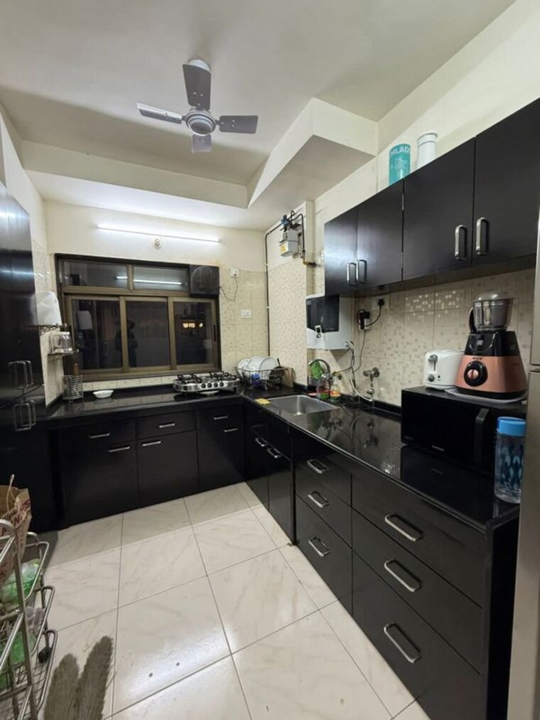 Kitchen, seven-bungalow 2 Bedroom 700 Sq.Ft. Apartment In Andheri West Mumbai 10464471
