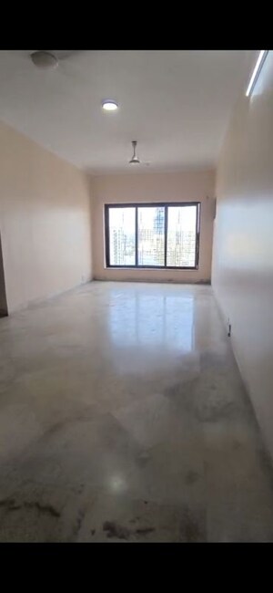 Living Room in 2 BHK Apartment at Yug Dharma Cooperative HSG society, Goregaon West – for Rent