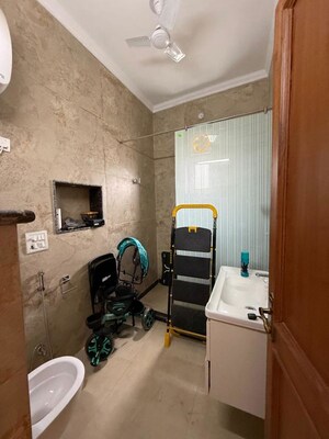 Bathroom in 3 BHK Builder Floor at Kalkaji – for Rent
