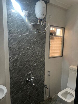 Bathroom in 1 BHK Apartment at Wadgaon Sheri – for Rent