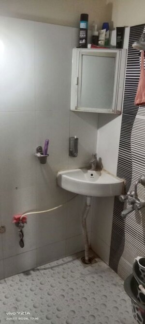 Bathroom in 2 BHK Apartment at Puranik City, Kasarvadavali – for Rent