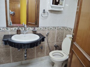 Bathroom in 3 BHK Builder Floor at Kalkaji – for Rent