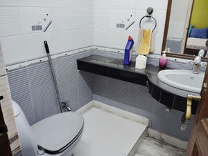 Bathroom in 3 BHK Builder Floor at Kalkaji – for Rent