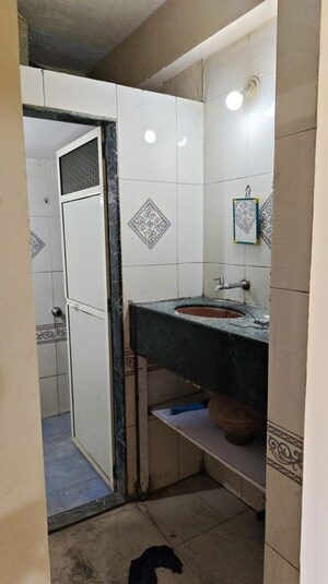 Kitchen in 1 BHK Apartment at New Prathamesh Niwas CHS, Thakurli – for Rent
