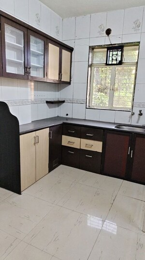 Kitchen in 1 BHK Apartment at New Prathamesh Niwas CHS, Thakurli – for Rent