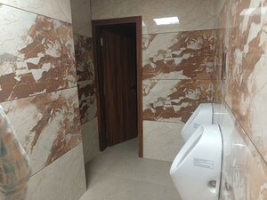 Bathroom in  Office Space at DLF Corporate Greens, Sector 74a – for Rent
