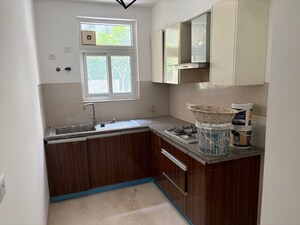 Kitchen in 3 BHK Apartment at Puri Aanandvilas, Sector 81 – for Sale