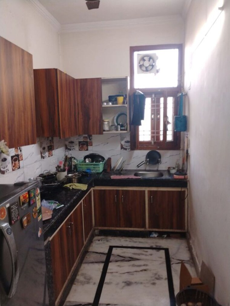 Kitchen, saj-ecostar 2 Bedroom 750 Sq.Ft. Apartment In Sector 104 Noida 10194524