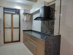 Kitchen in 2 BHK Apartment at Asmita Sand Dunes, Malad West – for Rent