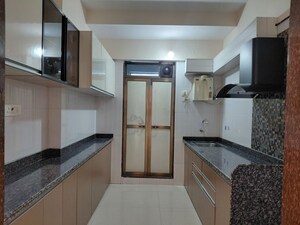 Kitchen in 2 BHK Apartment at Asmita Sand Dunes, Malad West – for Rent