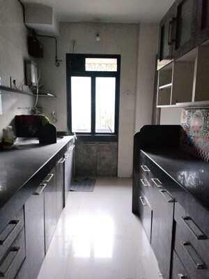 Kitchen in 2 BHK Apartment at Cosmos Park, Ghodbunder Road – for Rent