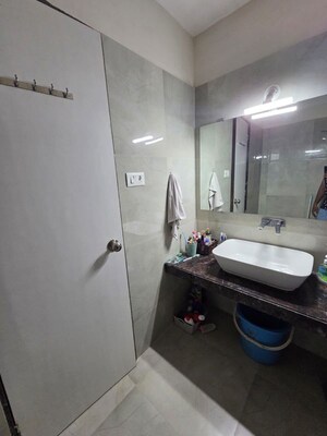 Bathroom in 1.5 BHK Apartment at Dosti Desire, Brahmand – for Rent