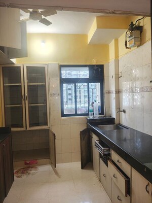 Kitchen in 1 BHK Apartment at Nandanvan Apartment, Thane West – for Rent