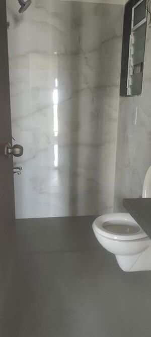 Bathroom in 1 BHK Apartment at Anant Metropolis Insignia Towers, Kasarvadavali – for Rent