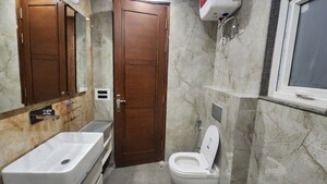 Bathroom in 4 BHK Builder Floor at Sector 15 – for Rent