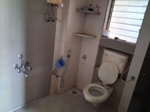 Bathroom in 2 BHK Apartment at Om Balaji Heights, Mira Road – for Rent