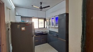 Kitchen in 1.5 BHK Apartment at Bodh Sneha Residency, Wadgaon Sheri – for Rent