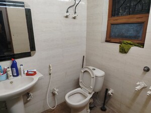 Bathroom in 1 BHK Builder Floor at CGHS Shatabdi Enclave, Sector 49 – for Rent