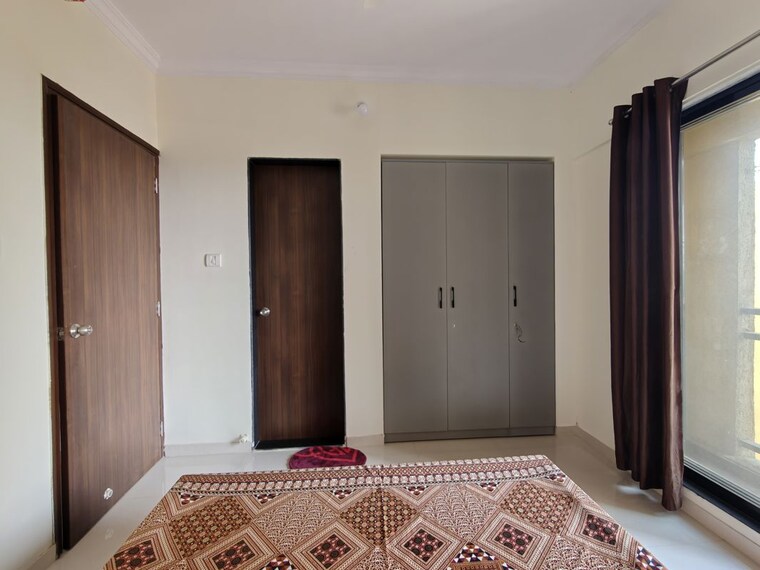 Bedroom, raunak-unnathi-woods-phase-7-a-and-b 2 Bedroom 550 Sq.Ft. Apartment In Ghodbunder Road Thane 10465159