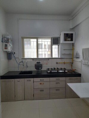 Kitchen in 1 BHK Apartment at Bodh Sneha Residency, Wadgaon Sheri – for Rent