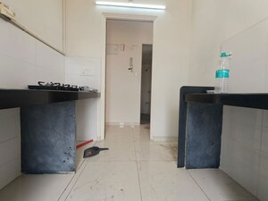 Kitchen in 1.5 BHK Apartment at Godrej Emerald, Ghodbunder Road – for Rent