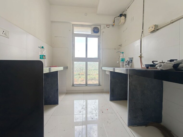 Kitchen, godrej-emerald 1.5 Bedroom 650 Sq.Ft. Apartment In Ghodbunder Road Thane 10465229