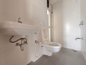Bathroom in 1.5 BHK Apartment at Godrej Emerald, Ghodbunder Road – for Rent