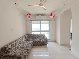 Living Room in 1.5 BHK Apartment at Godrej Emerald, Ghodbunder Road – for Rent
