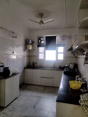 Kitchen in 3 BHK Apartment at Aman Luxury Apartments, Sahastradhara Road – for Sale