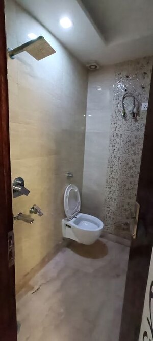 Bathroom in 3 BHK Apartment at Rohini Sector 8 – for Sale
