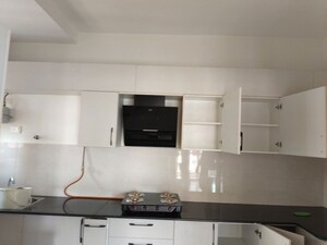 Kitchen in 2 BHK Apartment at Brigade Buena Vista, Budigere – for Rent