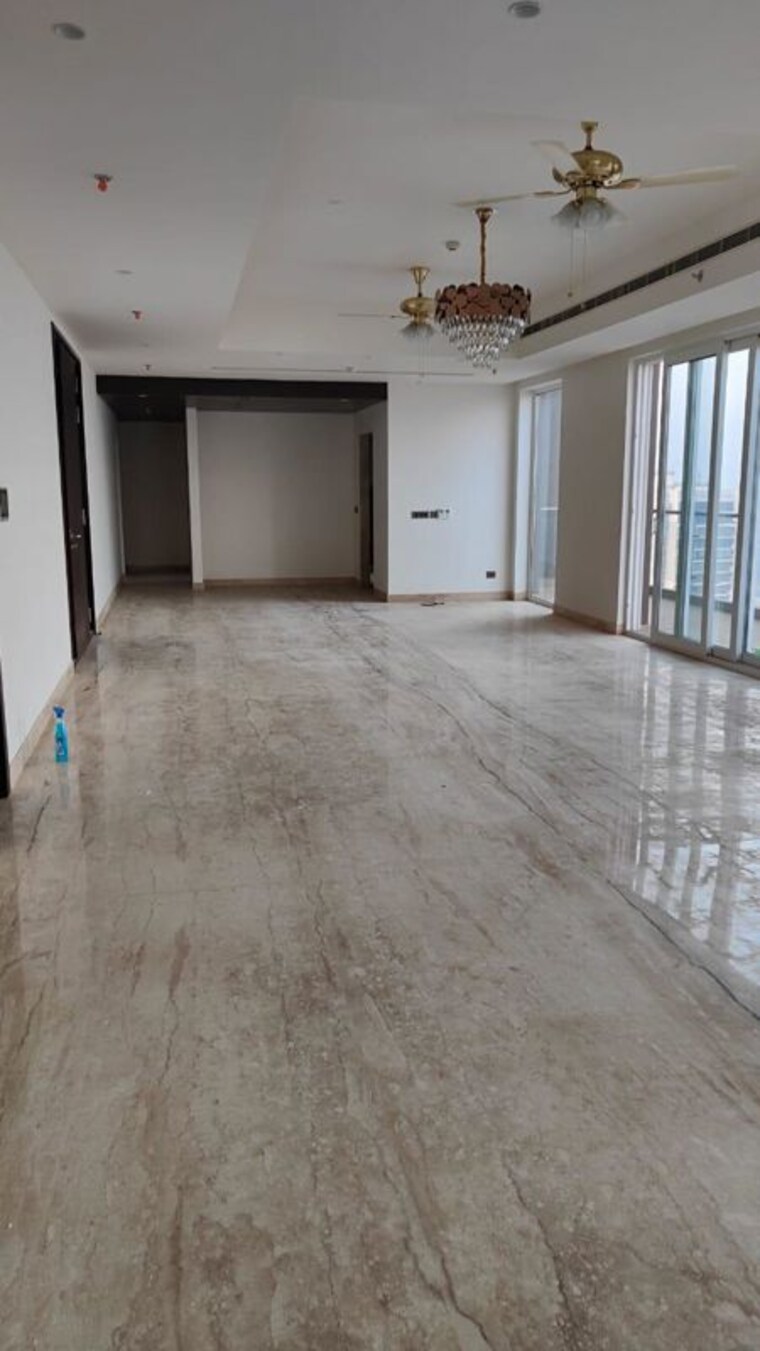 Living Room, mahindra-luminare 5 Bedroom 5800 Sq.Ft. Penthouse In Sector 59 Gurgaon 10465741