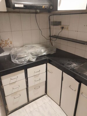 Kitchen in 2 BHK Apartment at Nivara Deepanjali CHSL, Vile Parle East – for Rent