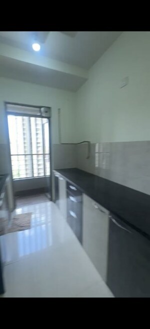 Kitchen in 2 BHK Apartment at Kalpataru Paramount B, Kapur Bawdi – for Sale