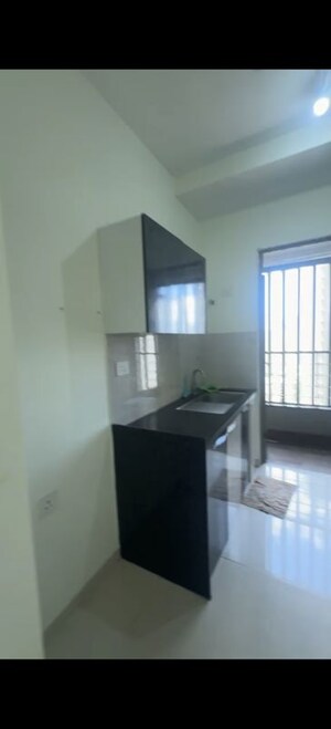 Kitchen in 2 BHK Apartment at Kalpataru Paramount B, Kapur Bawdi – for Sale