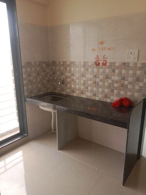 Kitchen in 1 BHK Apartment at Ornate Galaxy, Naigaon East – for Rent