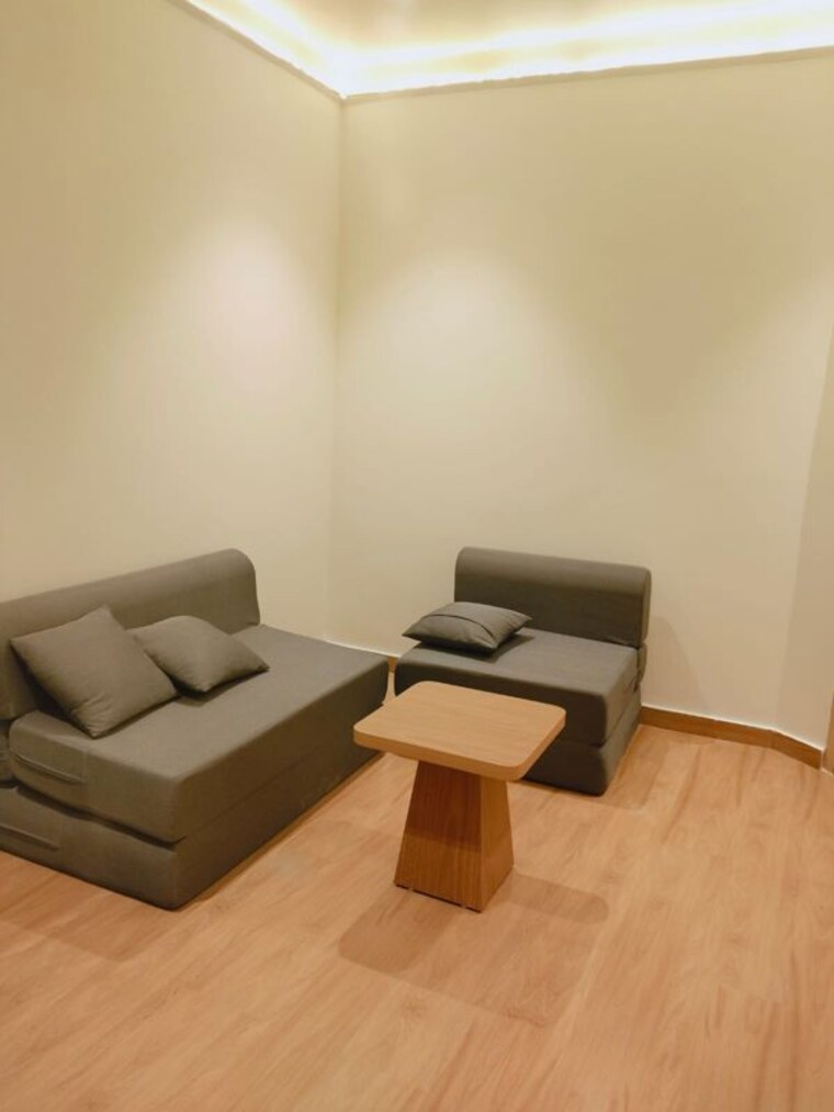 Living Room, ansal-api-happy-homes 1 Bedroom 869 Sq.Ft. Builder Floor In Sector 42 Gurgaon 10465814