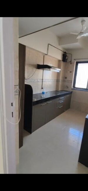 Kitchen in 2 BHK Apartment at K Raheja Palm Spring, Malad West – for Sale
