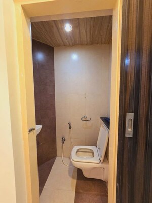Bathroom in 2 BHK Apartment at Raj Infinia, Malad West – for Rent