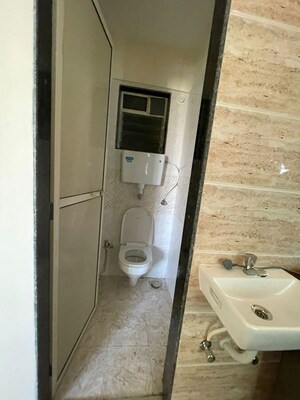Bathroom in 2 BHK Apartment at Raj Infinia, Malad West – for Rent