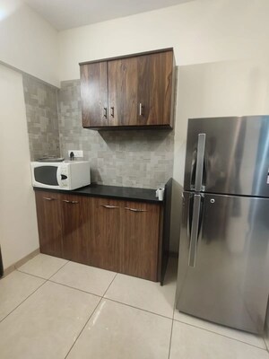Kitchen in 2 BHK Apartment at Anand Eastwoods, Viman Nagar – for Rent