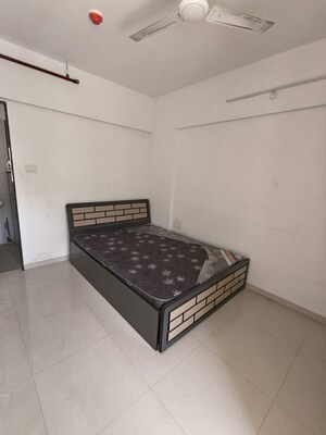 Bedroom in 2 BHK Apartment at Kolte Patil Little Earth, Kiwale – for Rent