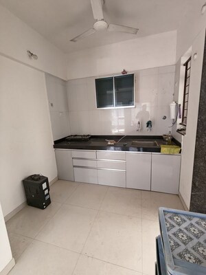Kitchen in 2 BHK Apartment at Kolte Patil Little Earth, Kiwale – for Rent