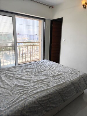 Bedroom in 1.5 BHK Apartment at Gami Jade, Vashi Sector 26 – for Rent