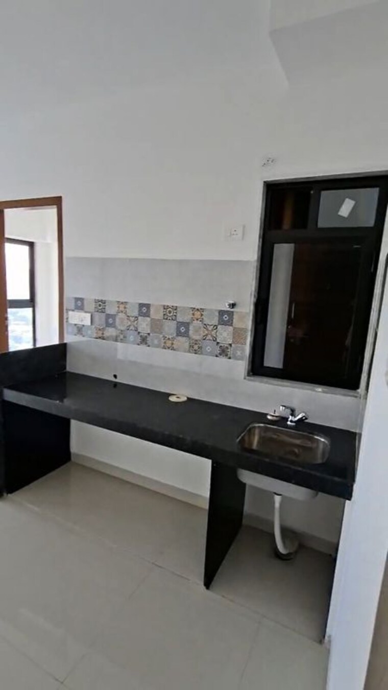 Kitchen, marathon-neo-square 1 Bedroom 258 Sq.Ft. Apartment In Tulshet Pada Mumbai 10442395
