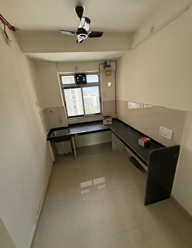 Kitchen, nirmal-city-of-joy 2 Bedroom 726 Sq.Ft. Apartment In Mulund West Mumbai 10435509