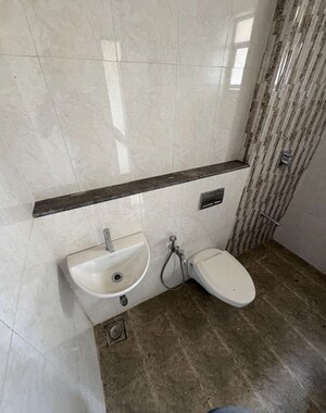Bathroom in 2 BHK Apartment at Nirmal City Of Joy, Mulund West – for Rent
