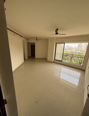 Room in 2 BHK Apartment at Nirmal City Of Joy, Mulund West – for Rent